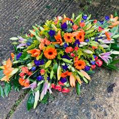 Vibrant casket spray