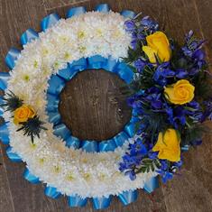 Blue &amp; yellow based wreath 