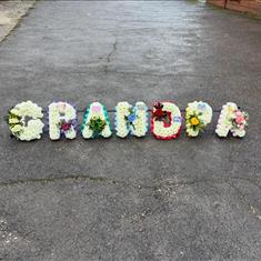 Grandpa in multi colour letters